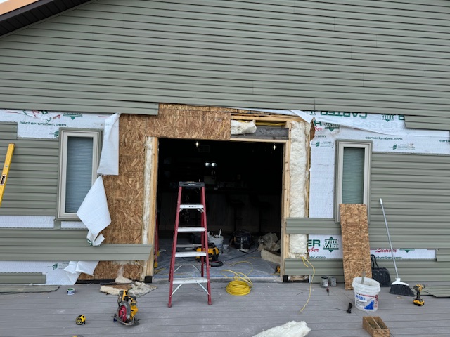 Outside view of French Door hole in building.